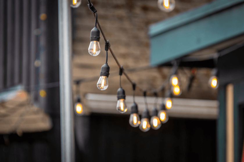 From Boring to Breathtaking: How to Hang Outdoor String Lights - True Value  Hardware